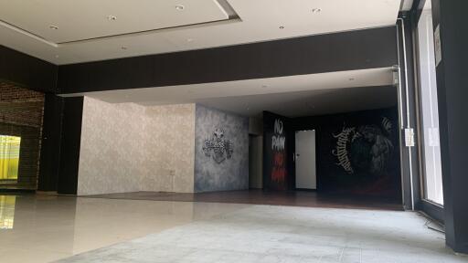 Empty commercial space with wall art