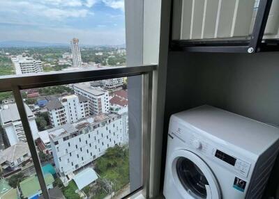 High-rise apartment laundry area with view