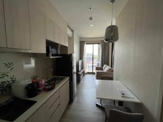 Modern kitchen with adjacent living area