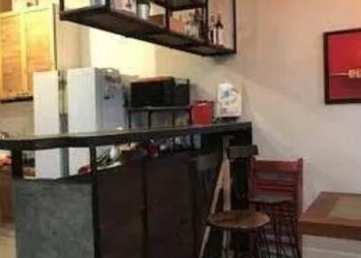 Modern kitchen with bar counter and stools