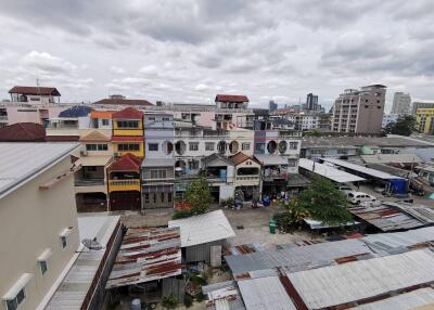 View of surrounding buildings and rooftops