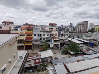 View of surrounding buildings and rooftops