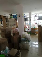 Storage room with boxes and shelves in a house