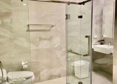 modern bathroom with glass shower enclosure