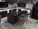 Modern kitchen with island and bar stools