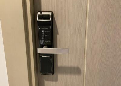 Close-up of a door with electronic lock