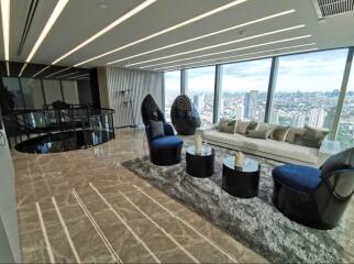 Modern spacious living room with panoramic city view