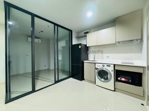 Modern kitchen with glass partition