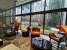 Modern living room with large windows and garden view