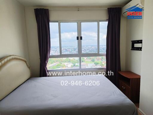 Bedroom with view through a large window