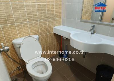 A well-lit bathroom with modern fixtures