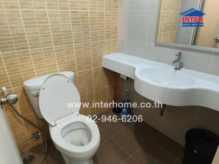 A well-lit bathroom with modern fixtures