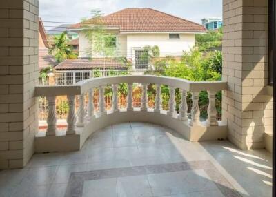 Spacious balcony with railing and view