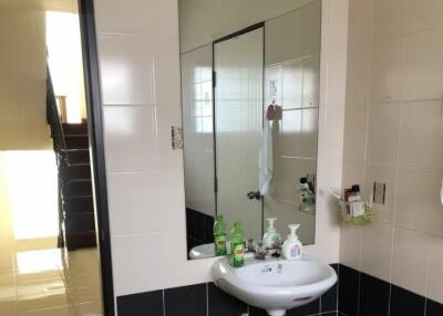 Bathroom with sink and mirror