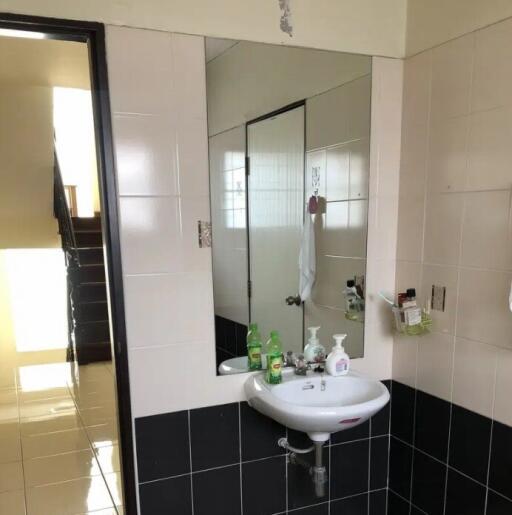Bathroom with sink and mirror