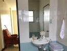 Bathroom with sink and mirror