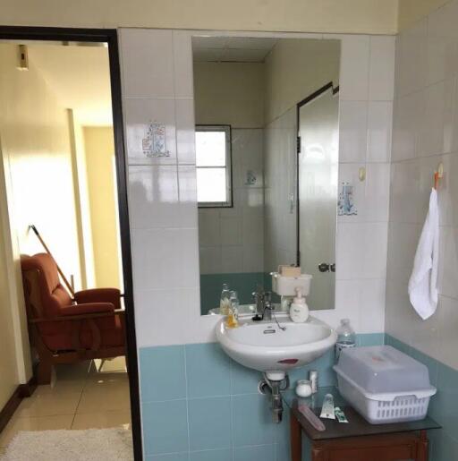 Bathroom with sink and mirror