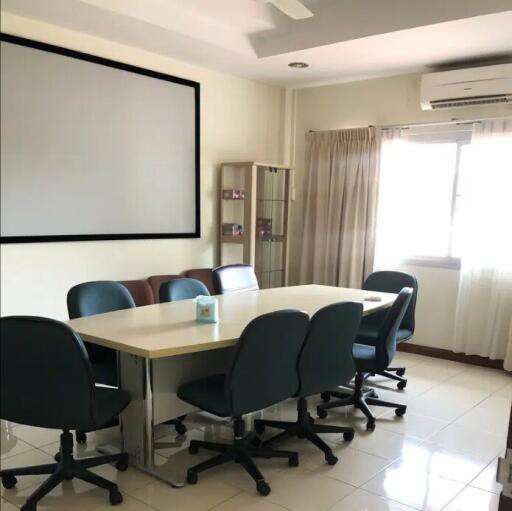 Conference room with table and chairs