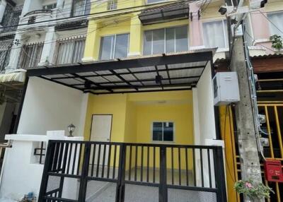 Facade of a multi-story townhouse