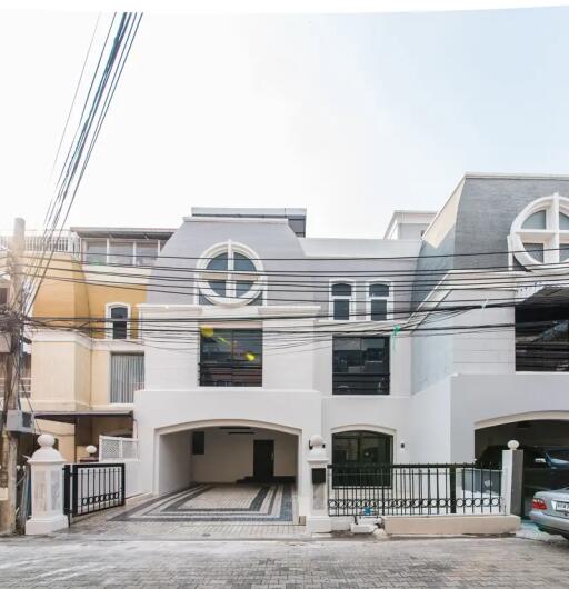 Modern residential building with driveway