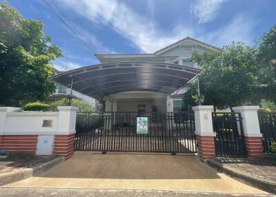 Front view of a house with a carport