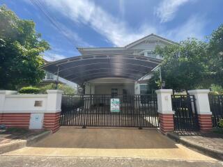 Front view of a house with a carport