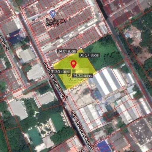 Aerial view of a land plot with boundary measurements