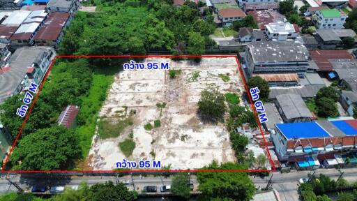 Aerial view of a vacant land plot marked with dimensions