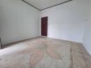 Empty bedroom with decorative floor