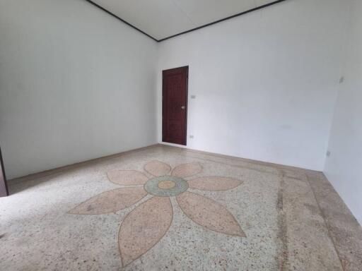 Empty bedroom with decorative floor