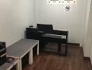 Music room with keyboard and seating