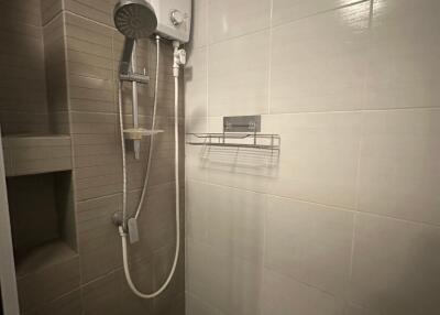 Bathroom with shower and water heater