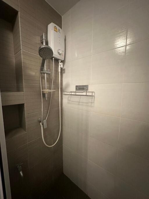 Bathroom with shower and water heater