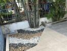 Patio area with tiled flooring and garden