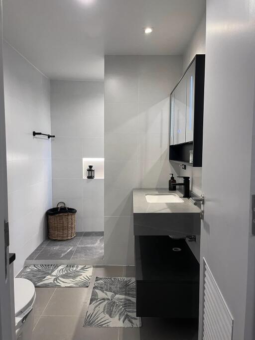 Modern bathroom with gray and white color scheme