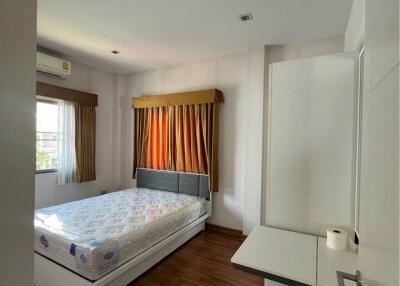 Spacious bedroom with double bed and window