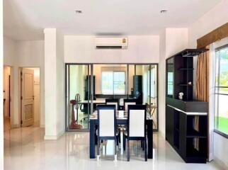 Modern dining area with glass partition