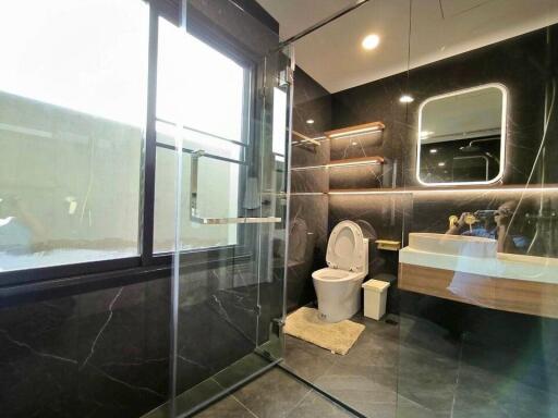 Modern bathroom with glass shower enclosure