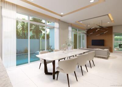 Modern dining area leading into a stylish living room with pool view