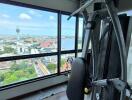 Gym with city view