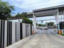 Property entrance with gate and security booth