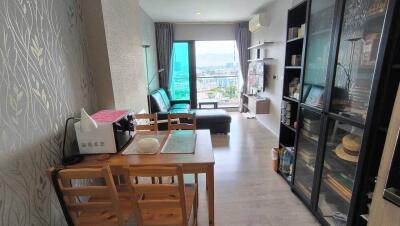 Living and dining area with large window