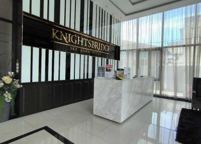 Lobby area with reception desk at Knightsbridge