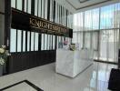 Lobby area with reception desk at Knightsbridge