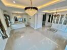 Spacious and elegant main living area with chandeliers