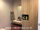 Bedroom with a small vanity area and built-in wooden wardrobe