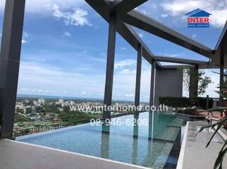 Rooftop infinity pool with city and ocean view