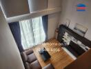 Spacious living room with a view of the balcony