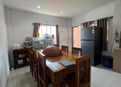 Dining area with wooden table and chairs