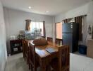 Dining area with wooden table and chairs